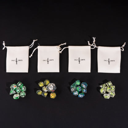 Little Friends Dice Bundle with four Only Crits drawstring dice bags, each paired with a colorful polyhedral dice set.