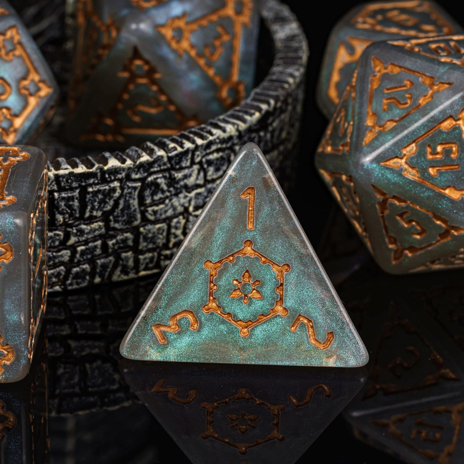 Close up of Moonlight Elixir Chonk D4 featuring ethereal teal shimmer and metallic copper numbering
