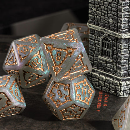 Moonlight Elixir Chonk D8 and D12 displayed beside castle terrain with shimmering teal highlights