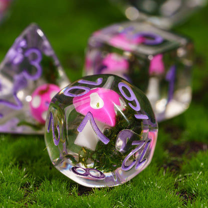 Mushroom Cap d20 closeup with pink mushroom for DnD and tabletop RPG, transparent resin with greenery and purple numbering
