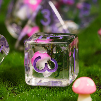 Mushroom Cap d6 closeup with pink mushroom inside for DnD and RPG, clear resin with greenery and purple numbers