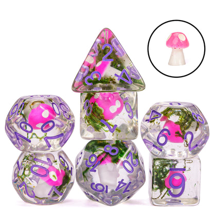 Mushroom Cap dice set stacked with pink mushrooms for DnD and RPG, clear resin with greenery and purple numbering