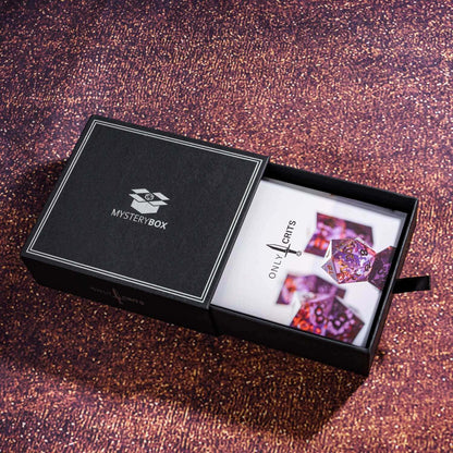 Only Crits Mystery Box with colorful sharp edge dice set inside