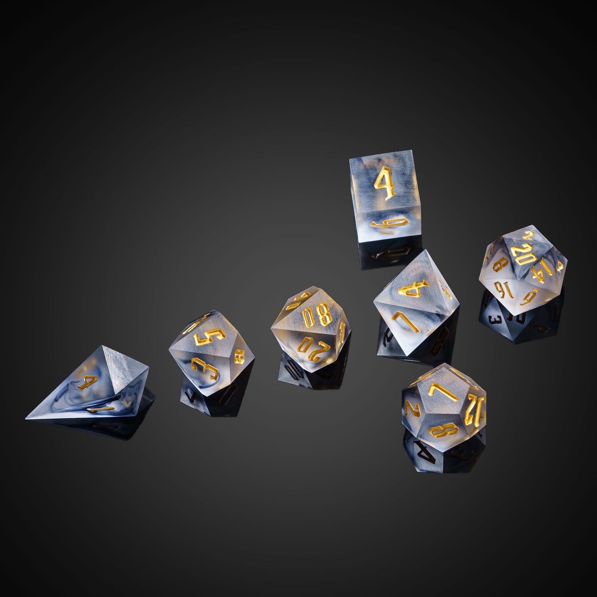 Nimbus Noir Sharp Edge Dice Set 7 piece set displayed on black reflective background for DnD & DnD 5e