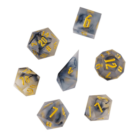 Flat lay of Nimbus Noir Sharp Edge Dice Set 7 piece dice collection for DnD & DnD 5e
