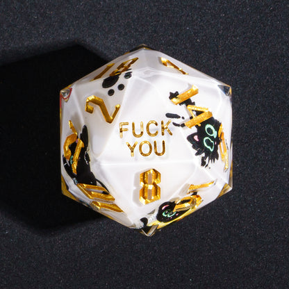Close up of Nocturne Whiskers Fuck You D20 with black cat graphics and gold numbers for DnD