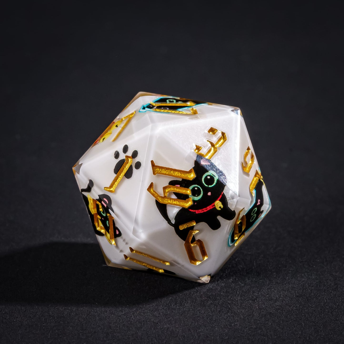 Close-up of Nocturne Whiskers black cat D20 sharp edge dice for tabletop RPG players