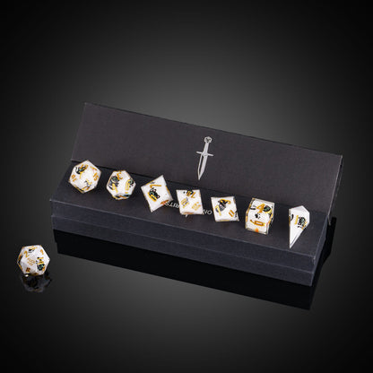 Nocturne Whiskers Sharp Edge Dice Set displayed in Only Crits box with gold numbering for DnD