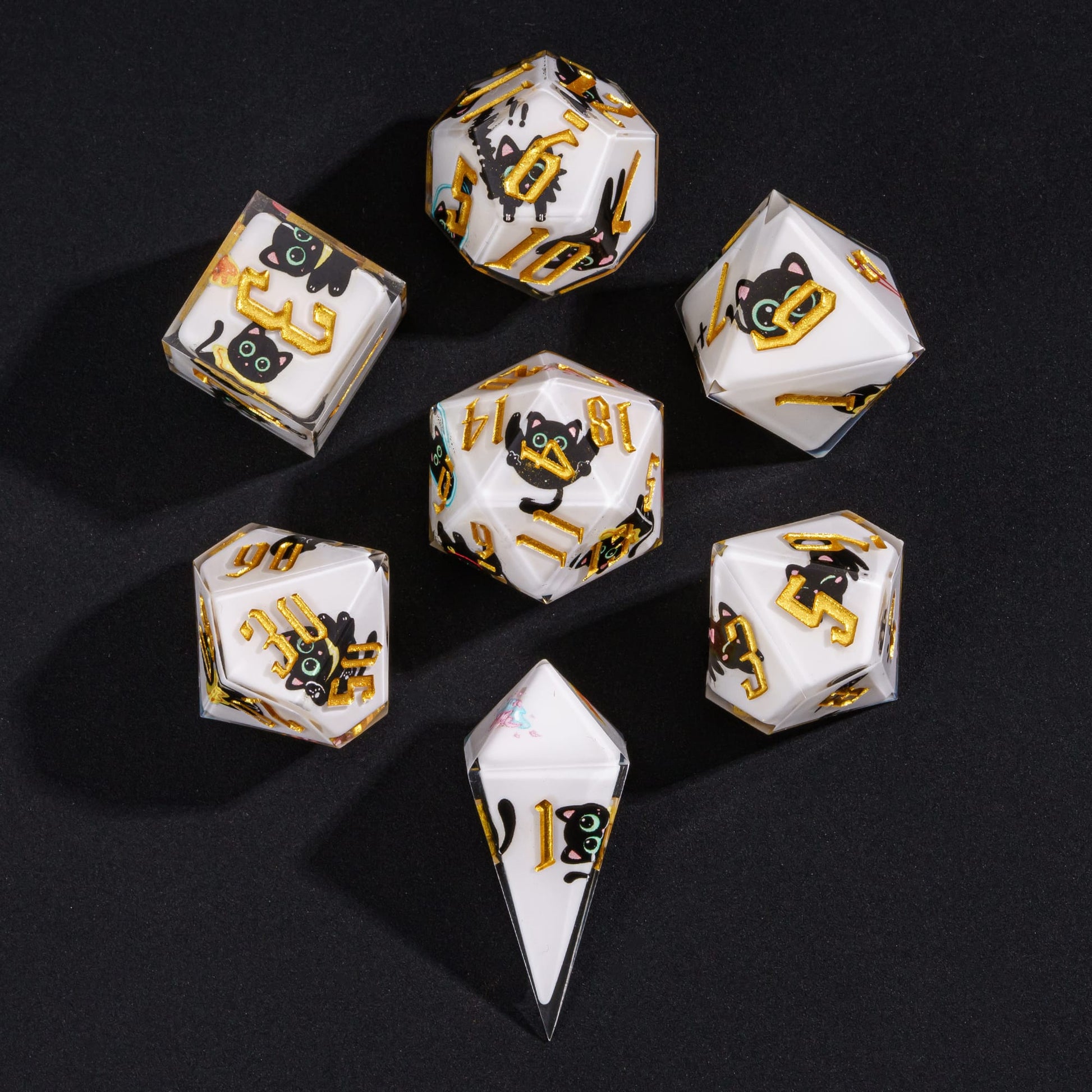Overhead view of Nocturne Whiskers 7-piece sharp edge dice set for DnD players