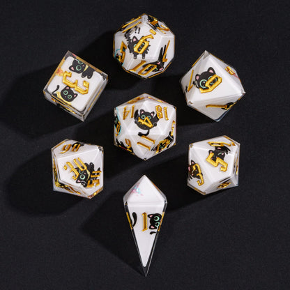 Overhead view of Nocturne Whiskers 7-piece sharp edge dice set for DnD players