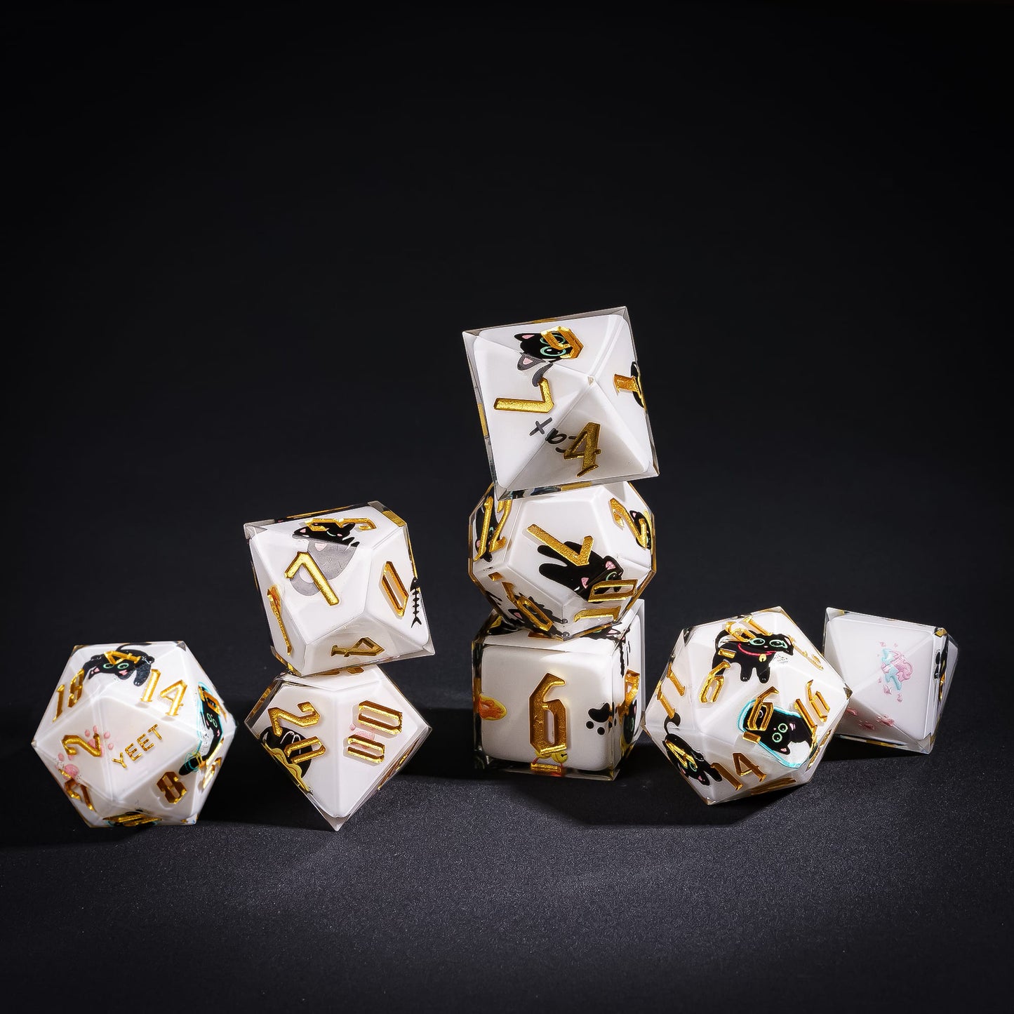 Stacked Nocturne Whiskers Yeet Sharp Edge Dice Set with black cat and gold numbering for DnD