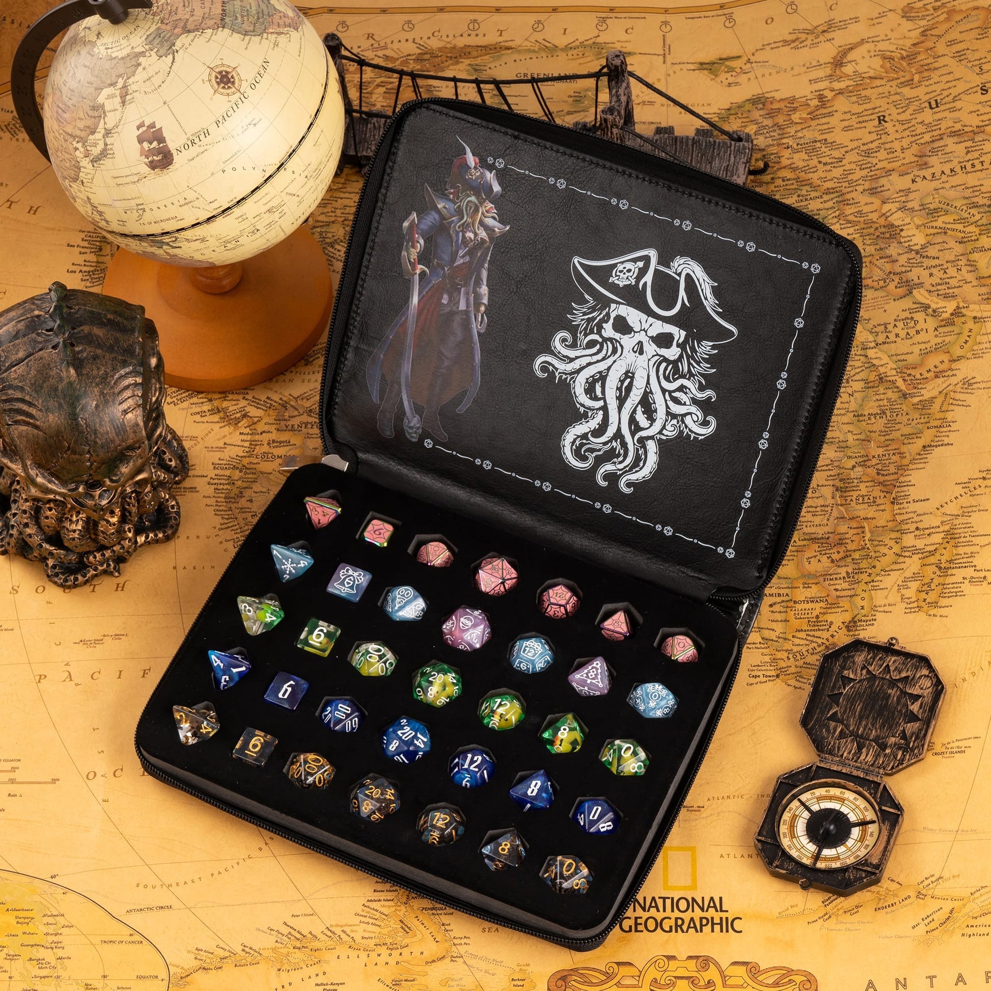 Only Crits Black Tide Dice Vault filled with colorful RPG dice sets and protective foam insert