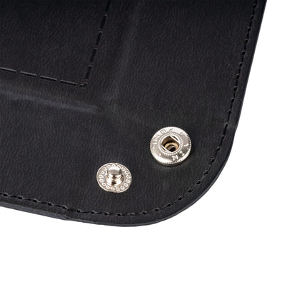 Closeup of silver snap button on Only Crits Dice Tray, foldable RPG dice rolling tray detail