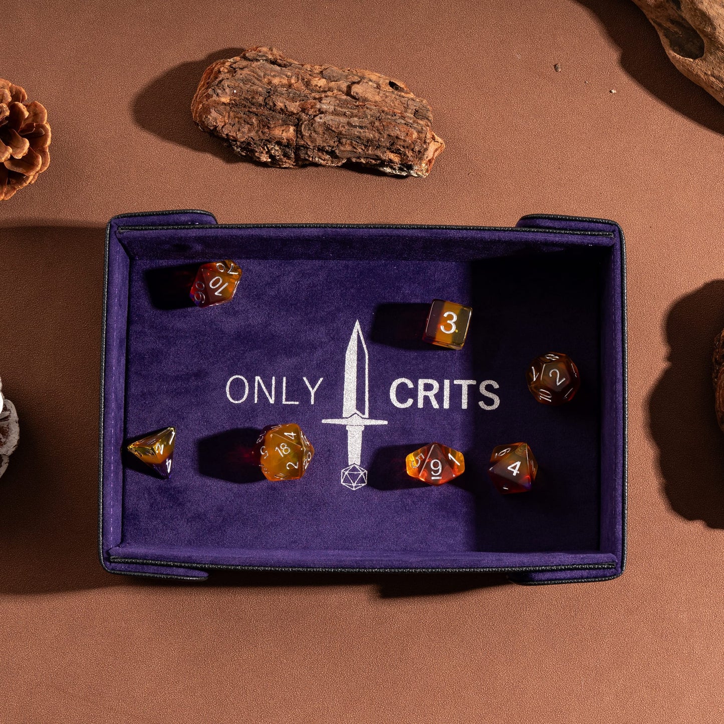 Only Crits Guildmaster Dice Tray in purple showcasing a complete tabletop RPG dice set