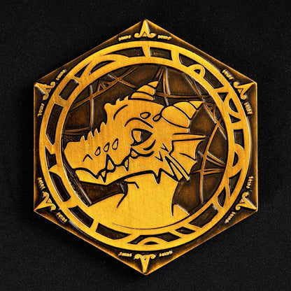 Close up of kobold side on gold metal Pack Tactics inspiration coin