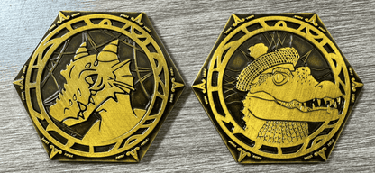 Pack Tactics Coin with kobold and gator artwork displayed on tabletop surface