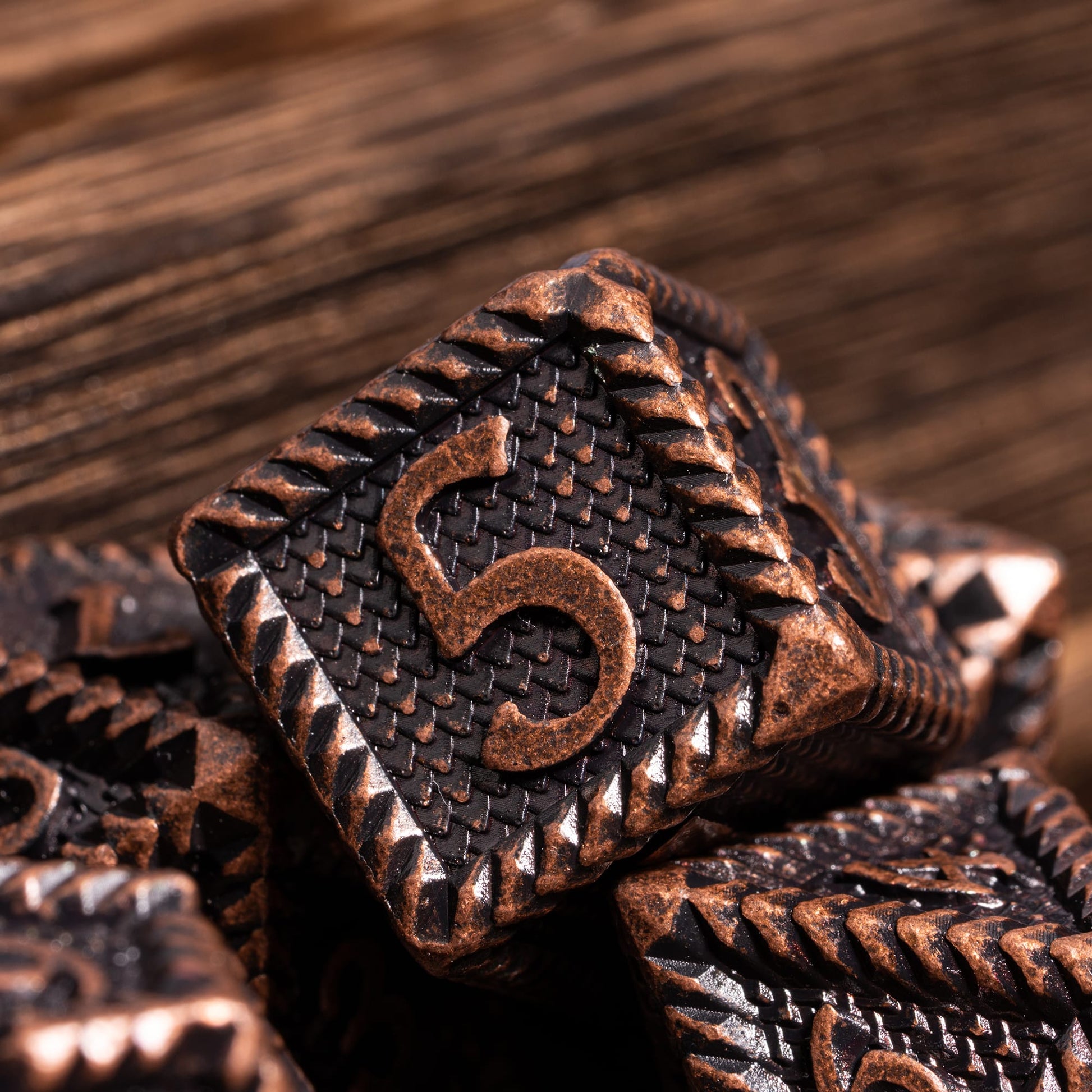 Predator's Maw Ancient Copper D6 dice close-up, hollow edge design metal die for DnD & DnD 5e