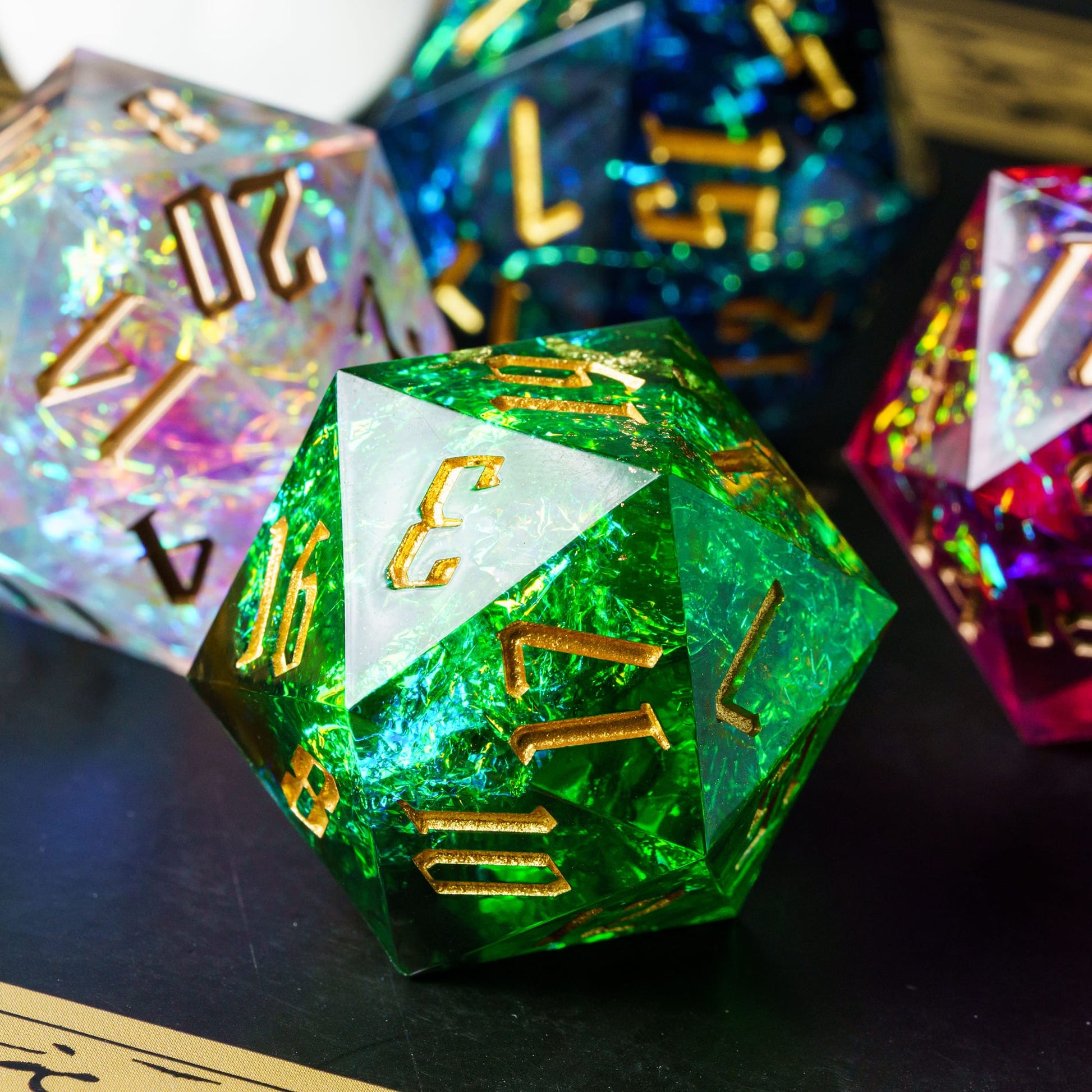 Green holographic sharp edge D20 dice surrounded by colorful resin dice