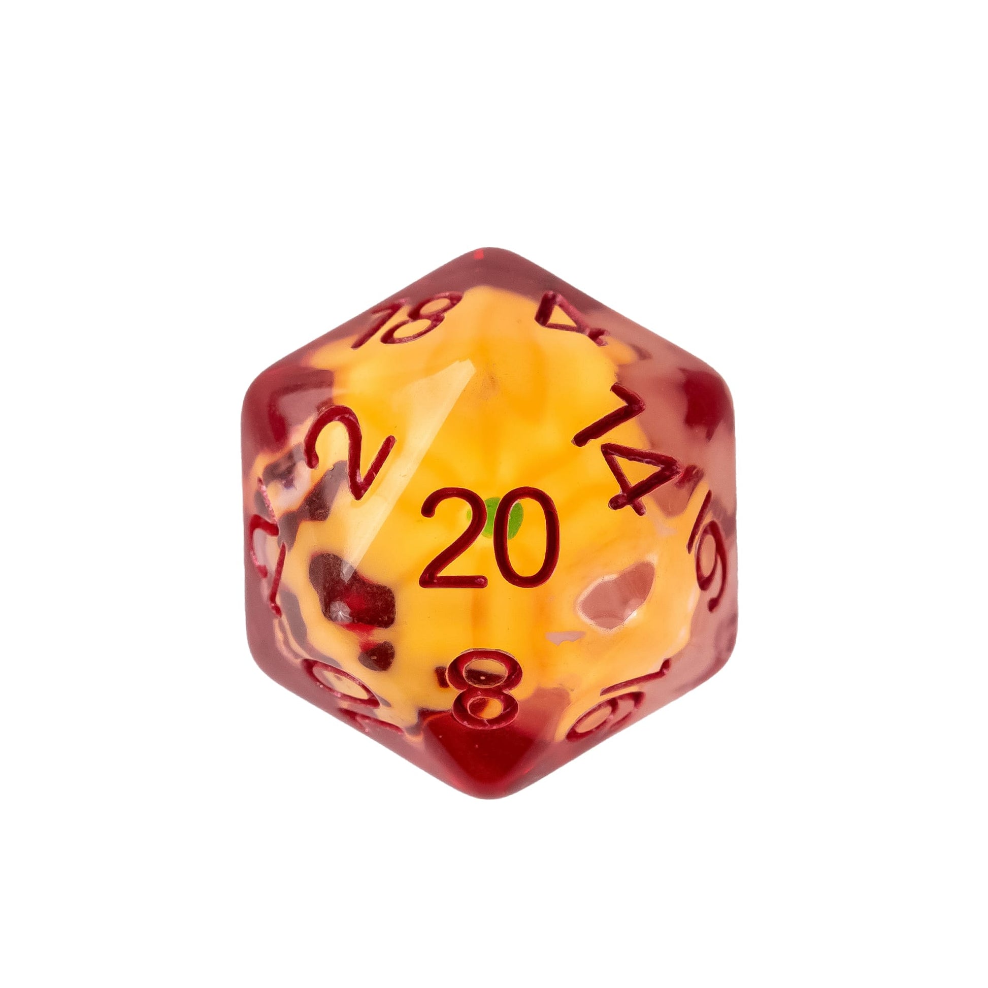 Close up of Pumpkin Lantern resin D20 featuring a glowing pumpkin inclusion inside red and clear resin with metallic red numbering for Dnd