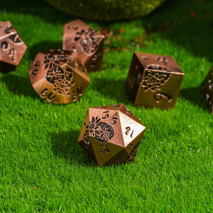 Rose Gold Lotus Blossom Metal D20 dice front view showing engraved lotus design for DnD & DnD 5e
