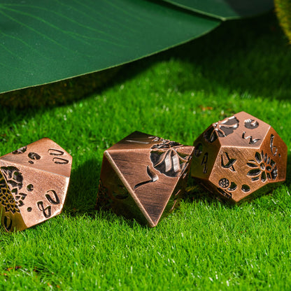 Rose Gold Lotus Blossom Metal D20 dice side view with lotus engravings for DnD & DnD 5e