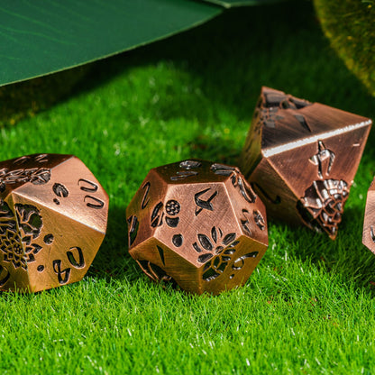 Group of Rose Gold Lotus Blossom Metal Dice Set with engraved floral details for DnD & DnD 5e