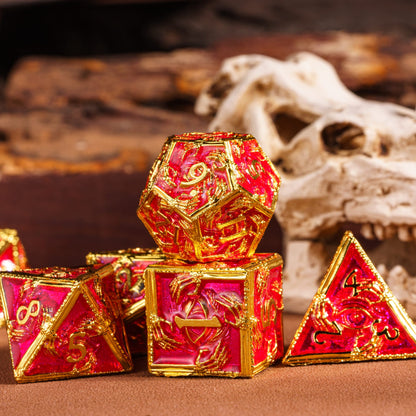 Royal Crypt Metal Dice Set red & gold dice closeup with skull background