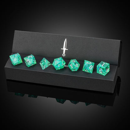 Sages Emerald dice set displayed in open case, green resin dice with silver numbers for DnD and RPG