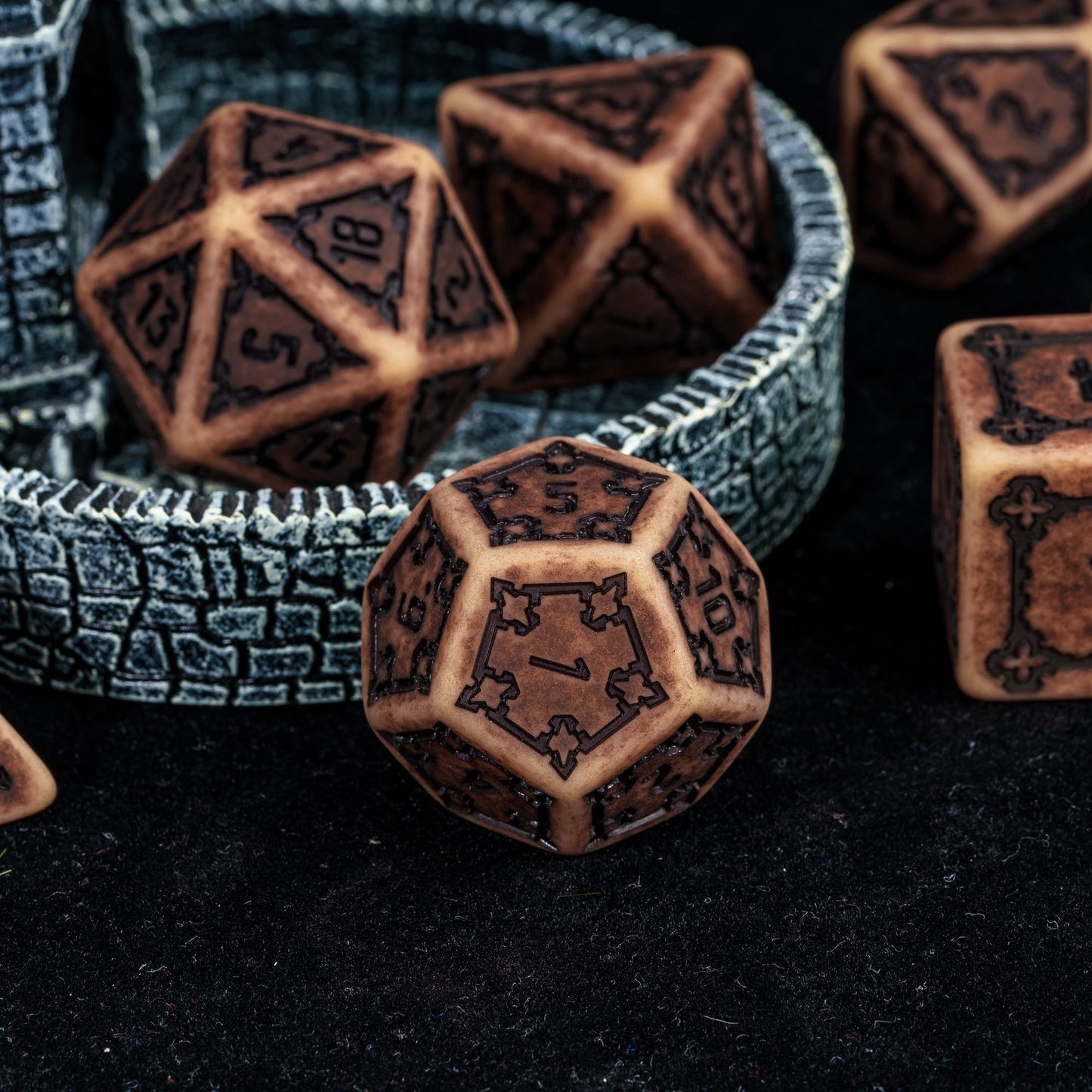 Sandy Elixir Chonk D12 displayed with castle themed terrain for DnD