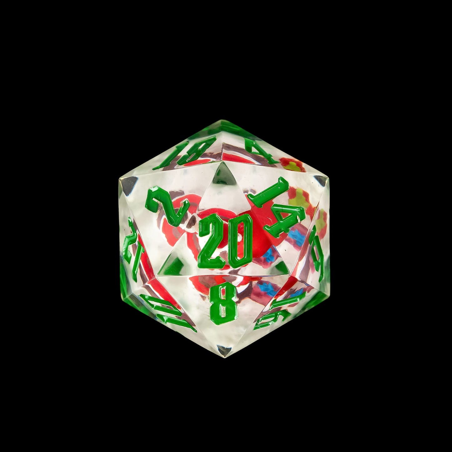 Close up of Santa's Workshop sharp edge D20 dice with festive resin design for DnD