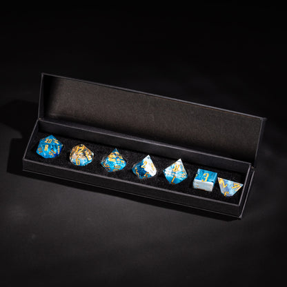 Shimmering Shoals sharp edge DnD dice set displayed in black presentation box