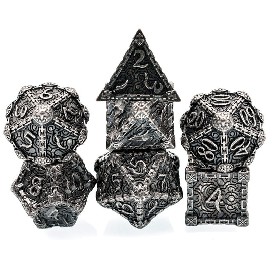 Silver Blade metal dagger dice set stacked for display, detailed engraved silver finish for DnD and tabletop RPG