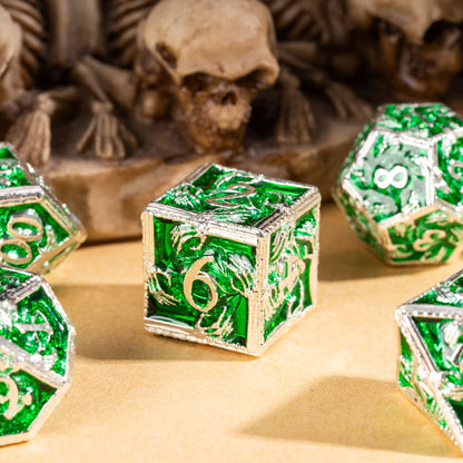Hero shot of Siren's Crypt metal D6 with emerald inlay and silver skeleton detailing