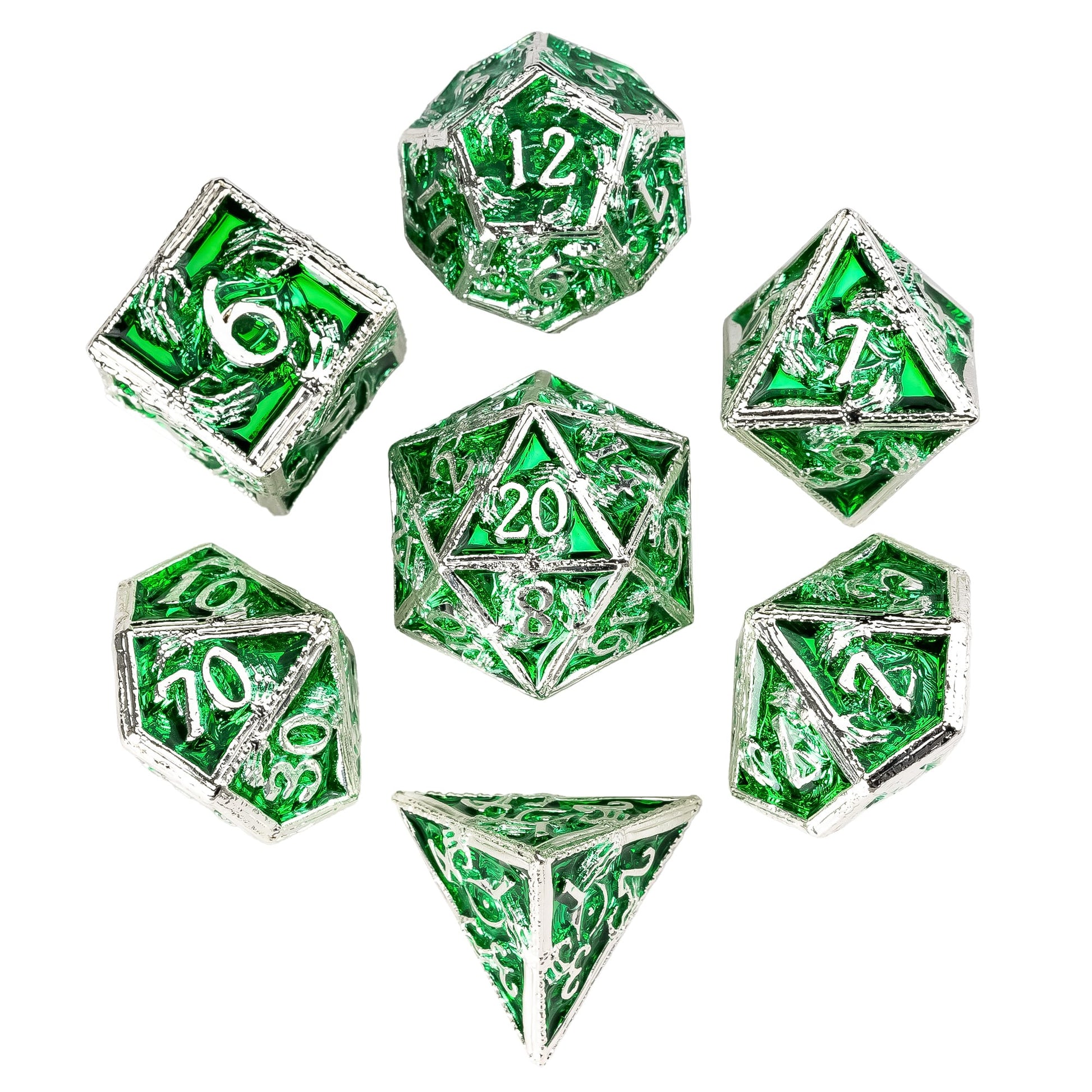 Flat lay of Siren's Crypt metal dice set with emerald green panels and silver dragon detailing for DnD