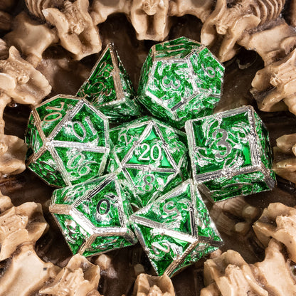 Siren's Crypt green metal DnD dice set styled on sand with skull background