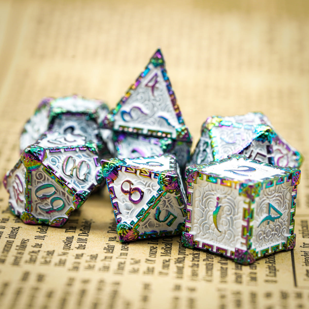 Snow Blade metal dagger dice set for DnD & TTRPG, display on book