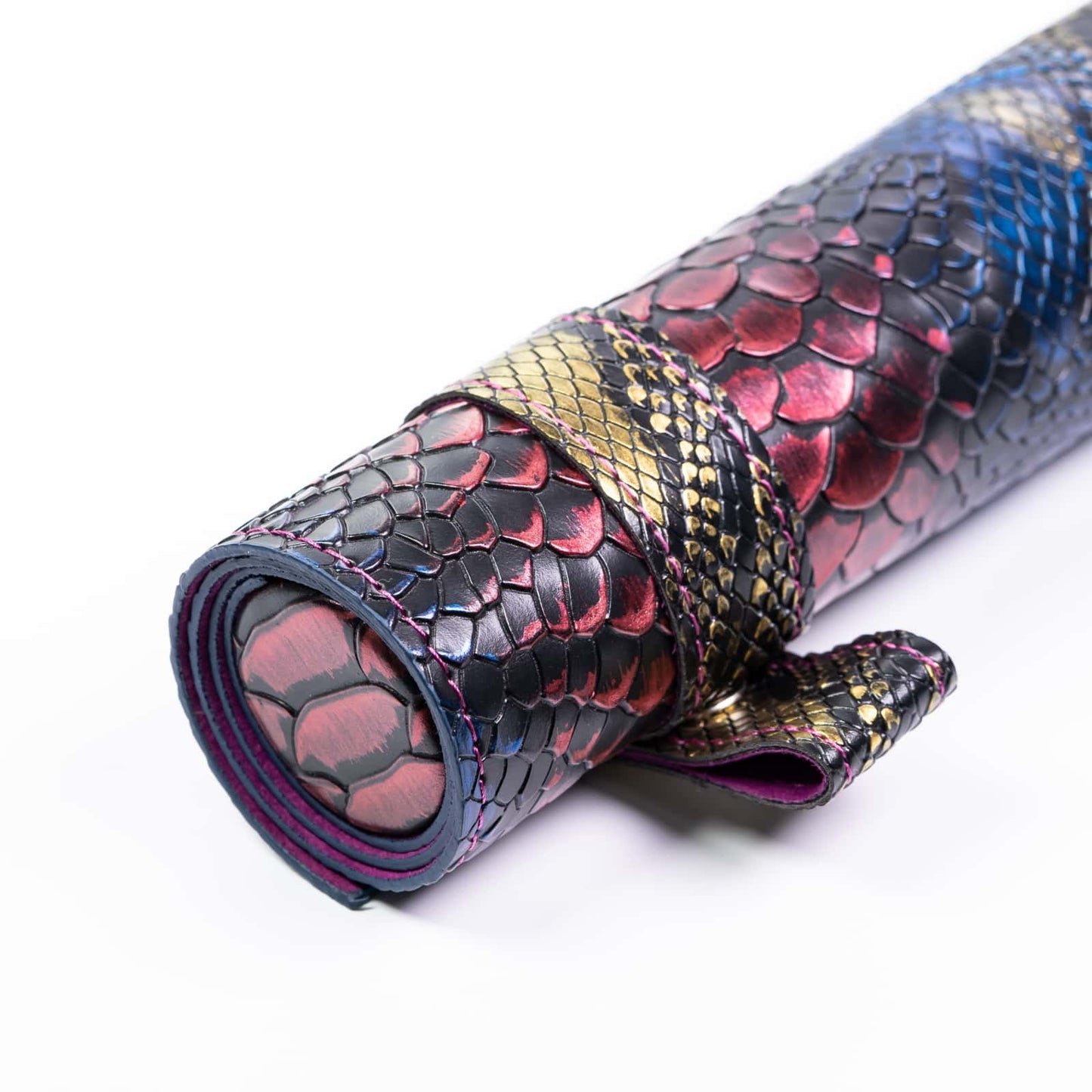 Close up of multicolor dragon scale Spell Scroll dice case for DnD