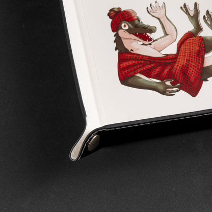 Close up of white dice tray corner and gator print detail