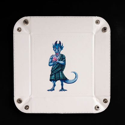 Square foldable dice tray with dice inside tray around kobold artwork