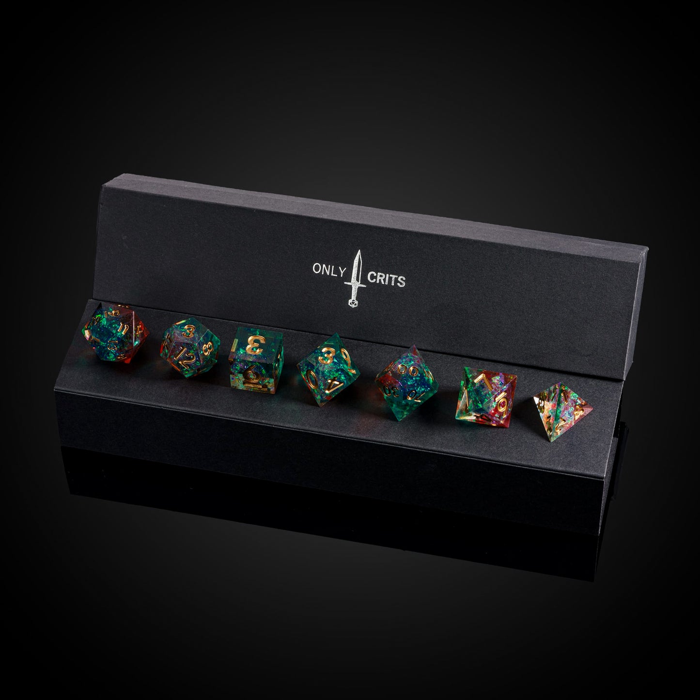 Starlight Nebula sharp edge dice set displayed in black presentation box with gold numbering