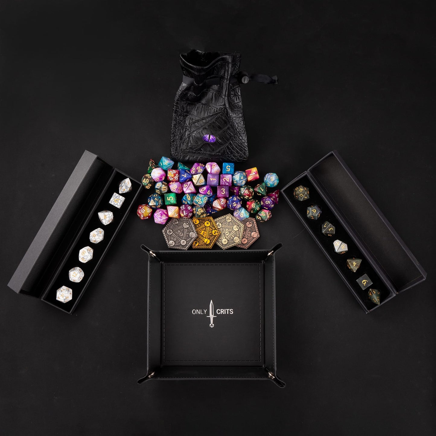 Stone Dice Bundle display featuring collectible dice sets, rolling tray, and accessories by Only Crit