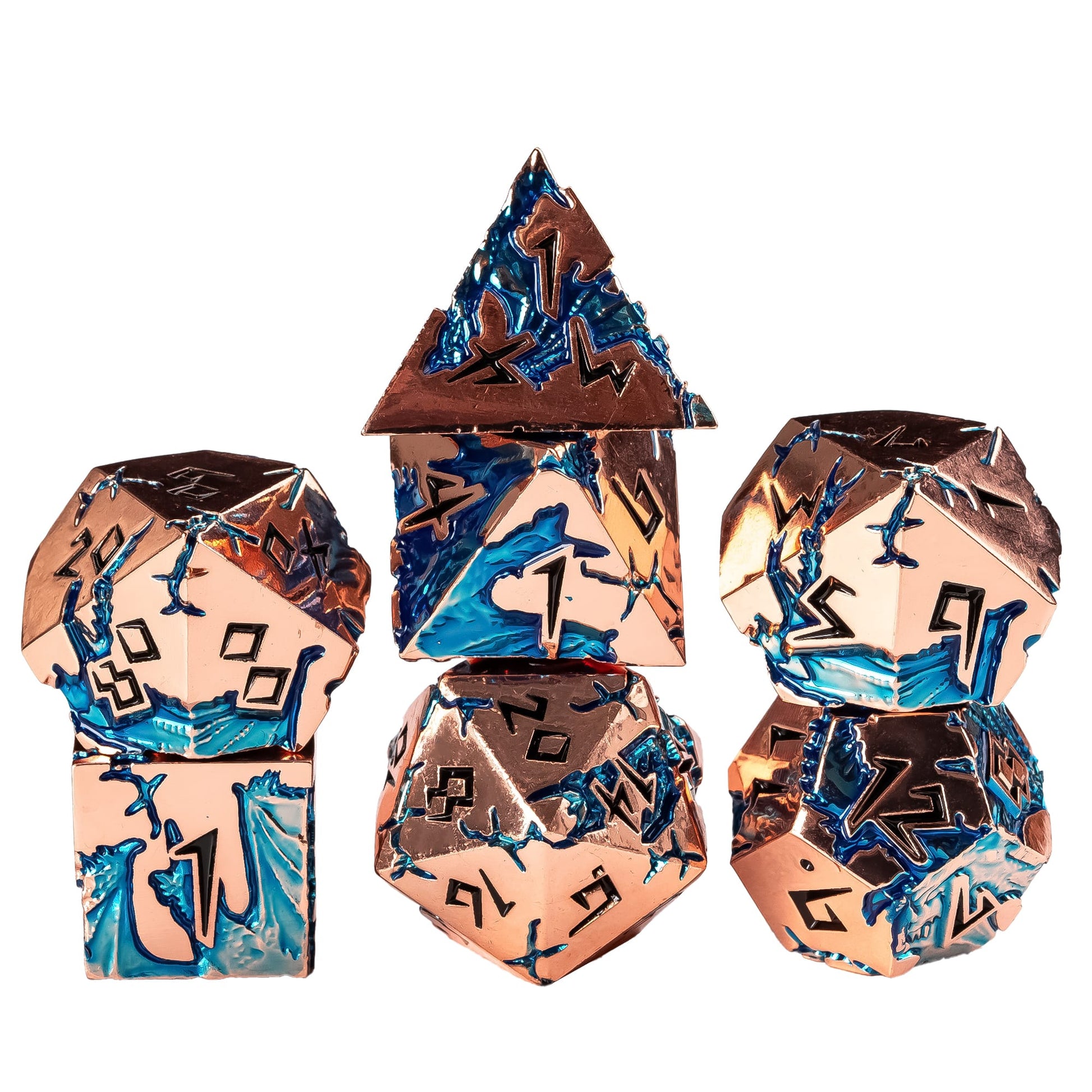 Stacked Stormwake Dragon metal dice set with rose gold finish and blue inlay for DnD