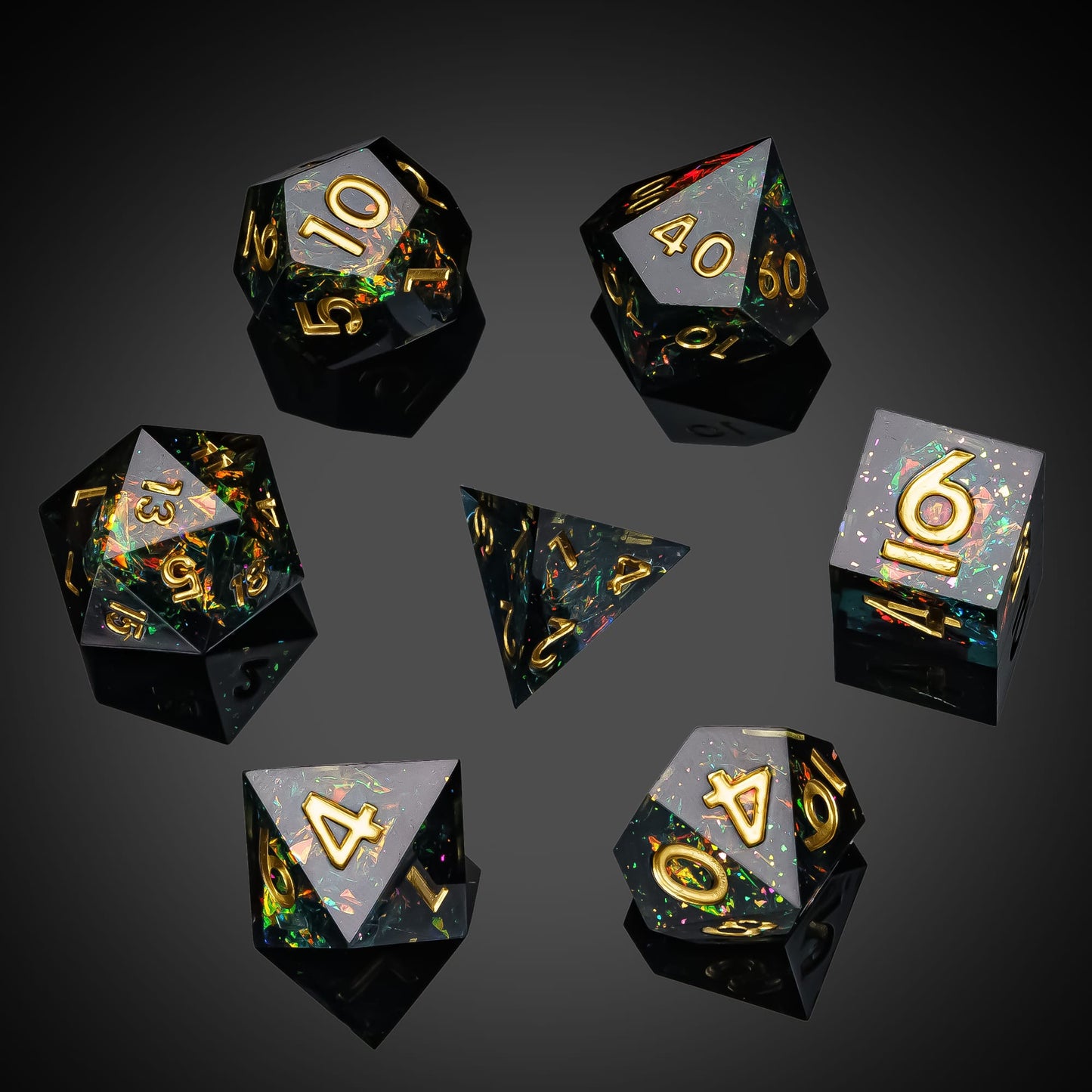 Supernova Remnant polyhedral dice set with iridescent flakes and gold numbering