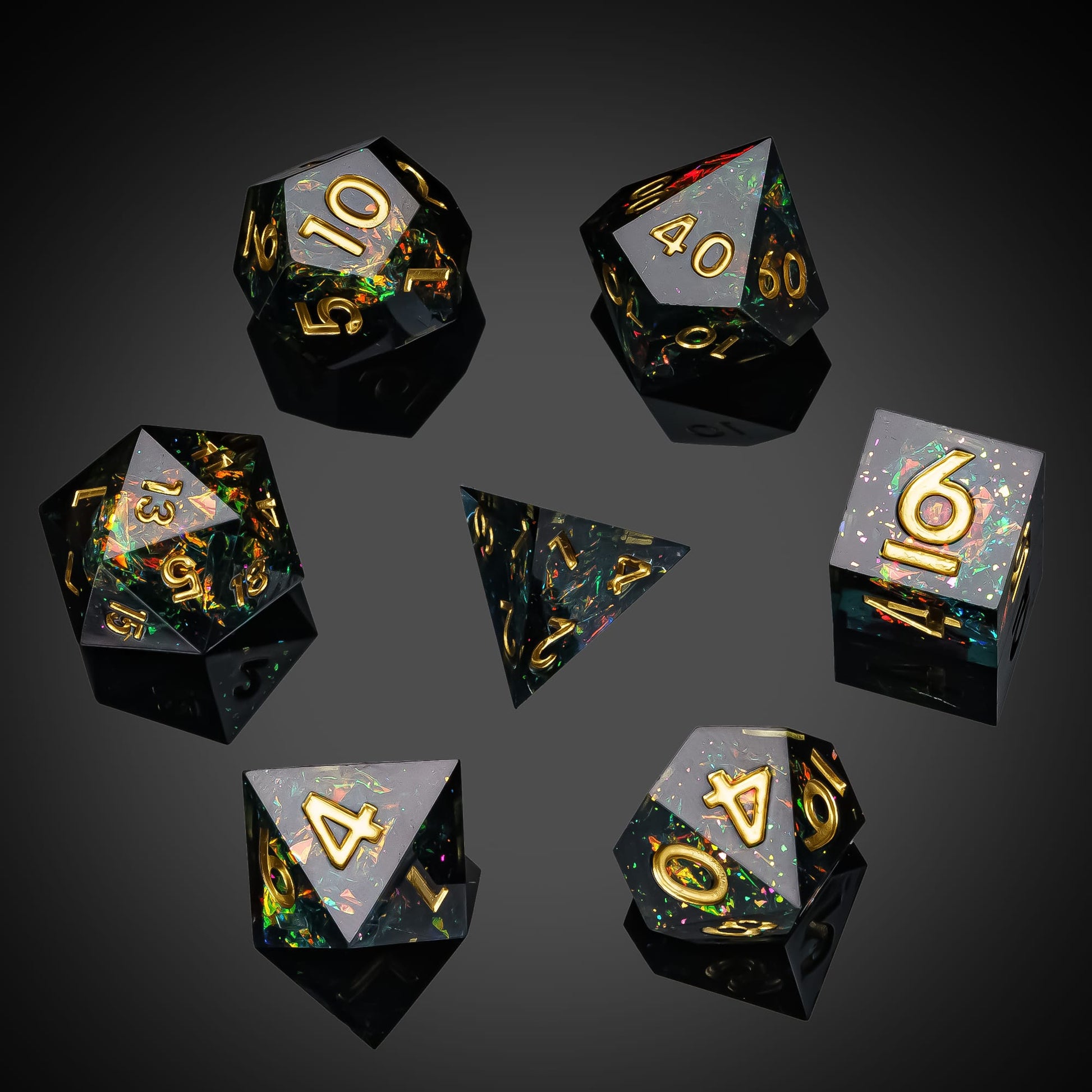 Supernova Remnant polyhedral dice set with iridescent flakes and gold numbering