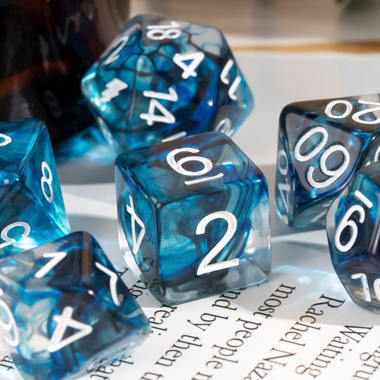 Thunderstrike Dice Set D6 close-up featuring swirling blue and gray resin with bold white numbering
