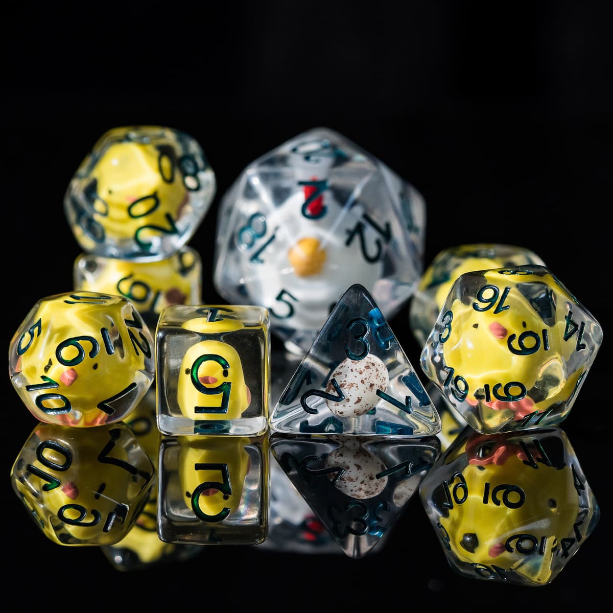 Close-up of Transparent Chicken 8 Piece Dice Set with yellow ducks inside for DnD & tabletop RPGs
