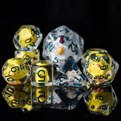 Close-up of Transparent Chicken 8 Piece Dice Set with yellow ducks inside for DnD & tabletop RPGs