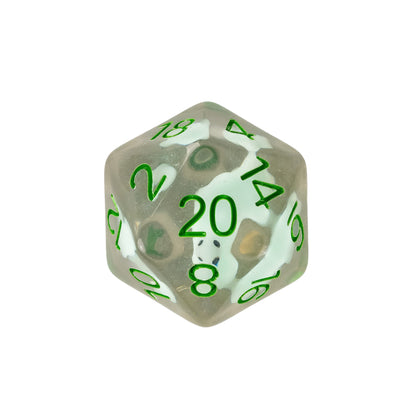 Close up of Transparent Dino resin D20 featuring a suspended dinosaur inclusion inside clear resin with white numbering for Dnd