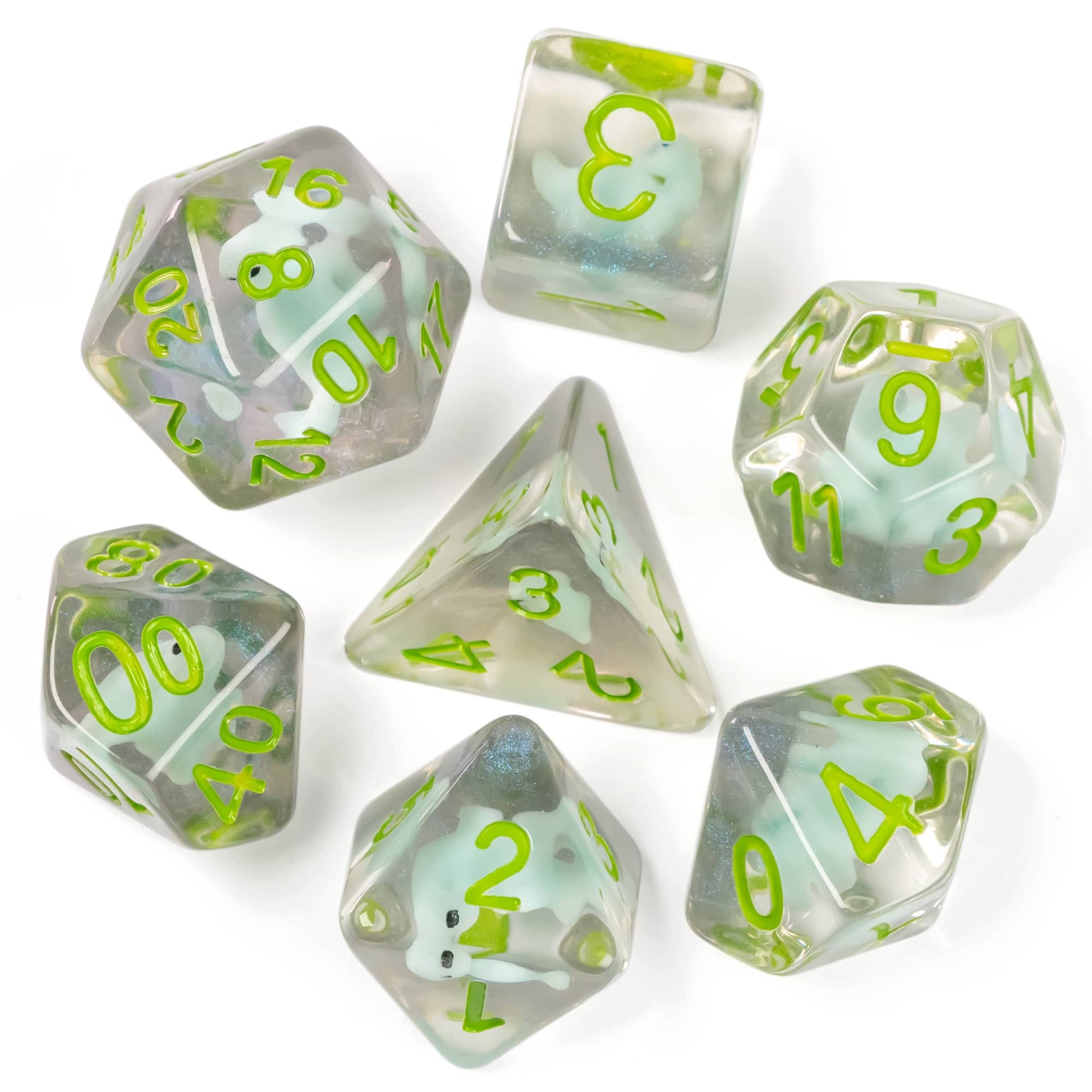 Top view of Transparent Dino Dice Set showing embedded dinosaur miniatures in clear green resin