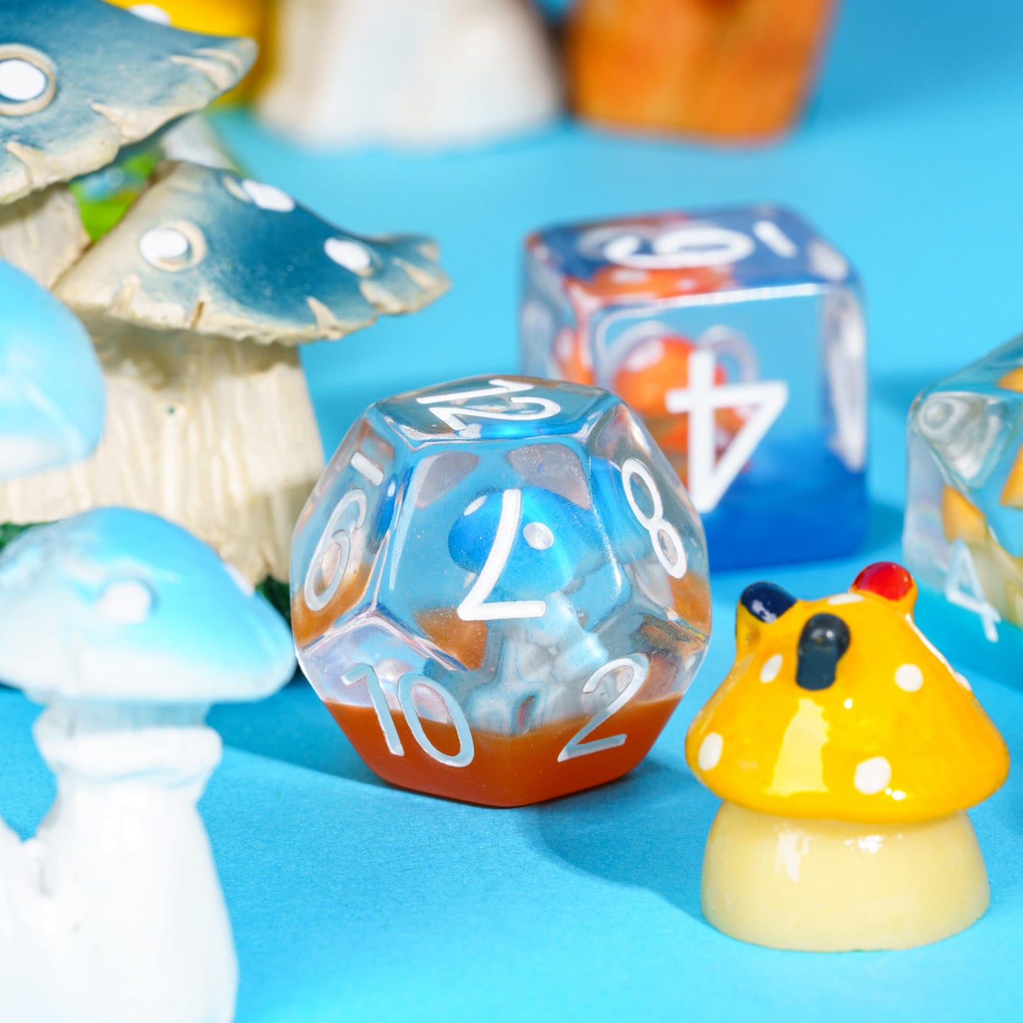 Close up Transparent Feyshroom resin dice, multicolor mushroom design polyhedral dice for RPG
